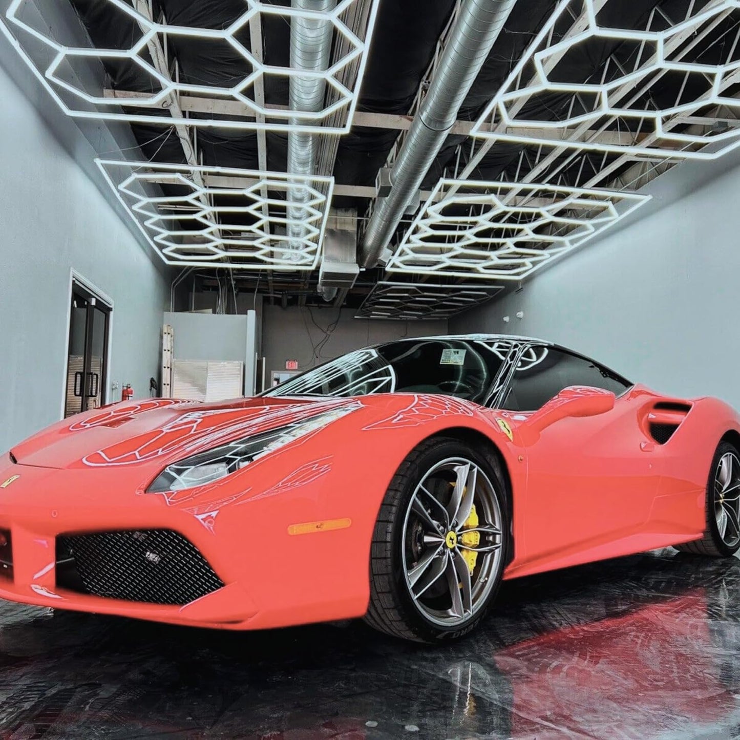 Hexagon LED light (14 grid) illuminating a sports car