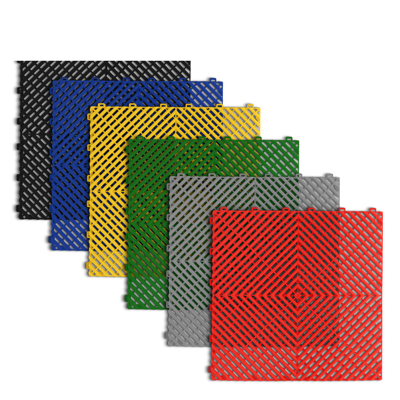 Plastic tile floor tile or mat in blue, black, grey, red, yellow, and green color