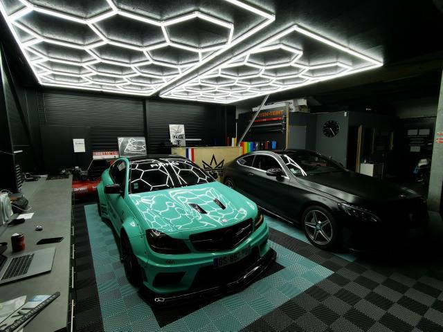 Multiple Hexagon LED lights (14 grid) in home garage